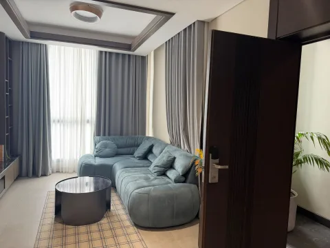 Appartement 3 pièces 204 de The Stay : le salon avec canapé d’angle