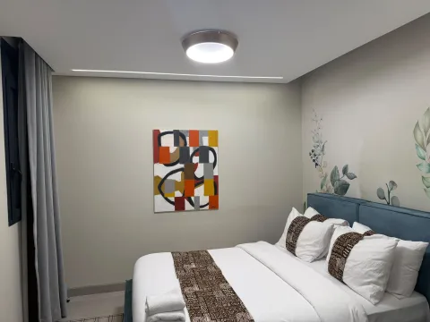 Appartement 3 pièces 204 de The Stay : une chambre avec lit double