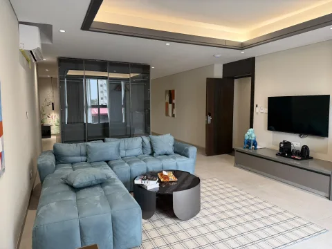 Suite 301 de The Stay : le salon avec canapé d’angle